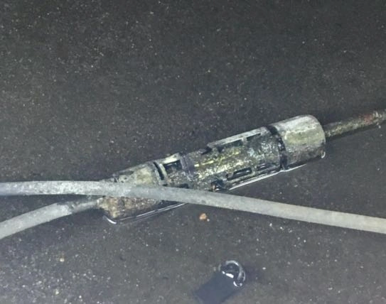 A connector that has been in water for a very long time and has become quite corroded